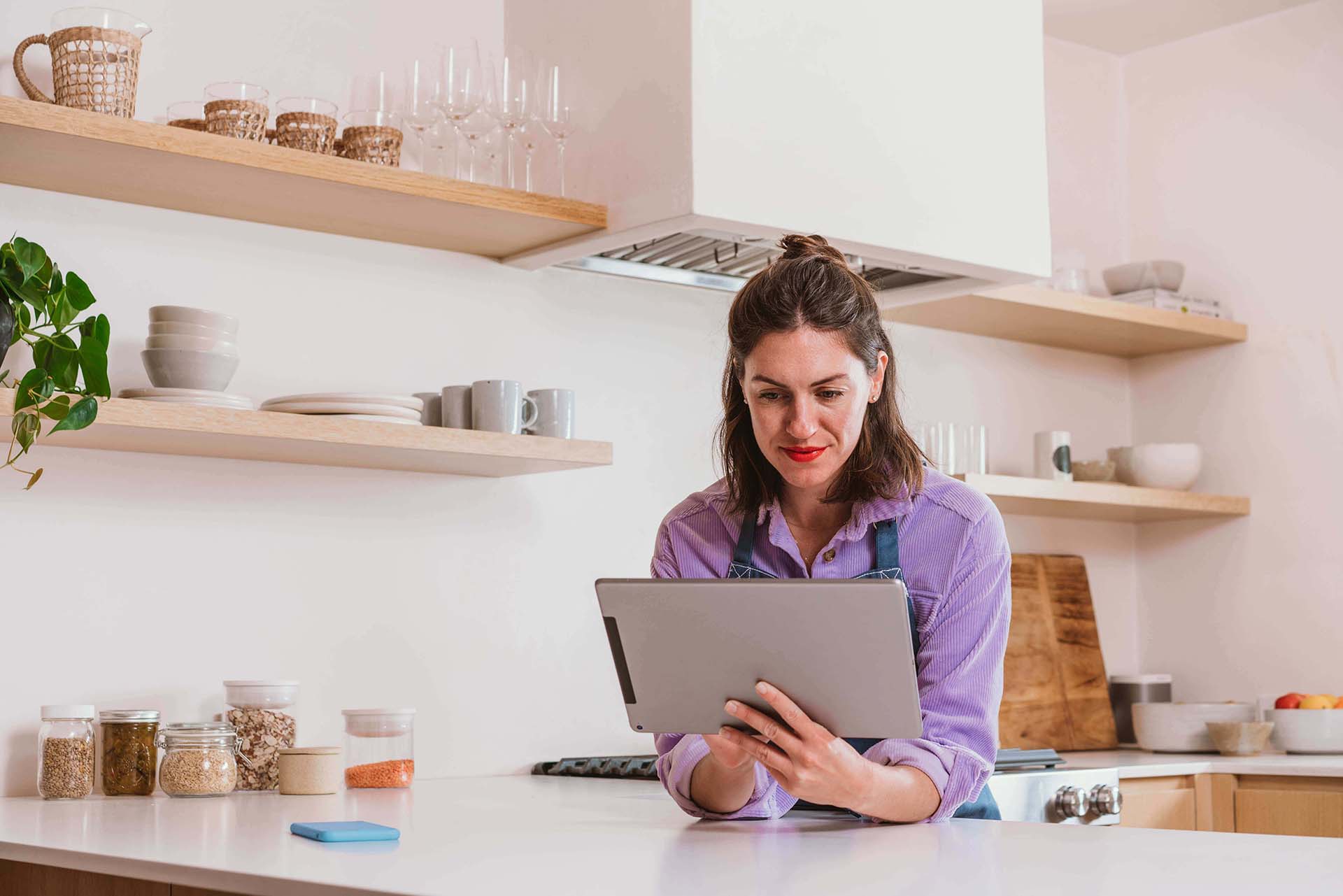 woman using large tablet