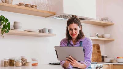 woman using large tablet